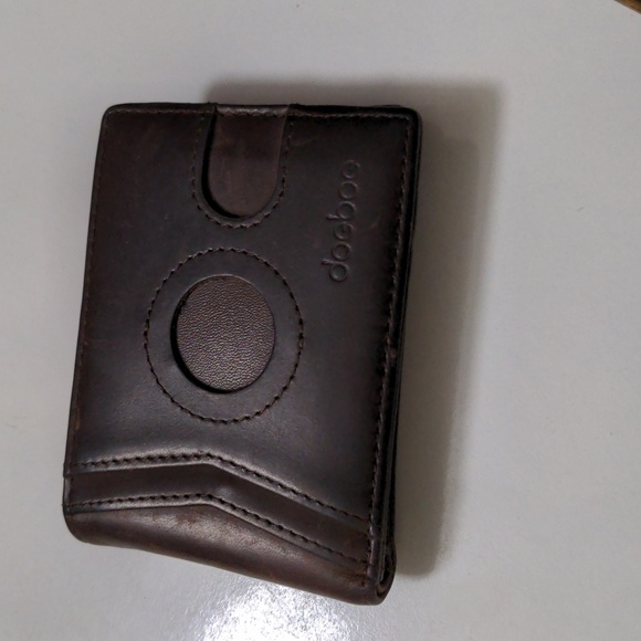 A worn leather wallet - Picture 1 of 1